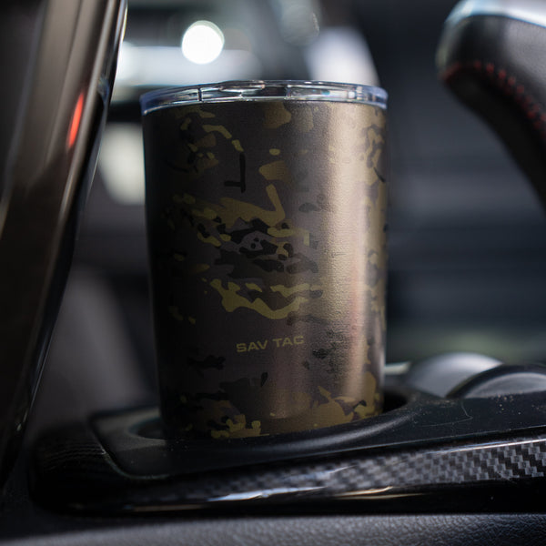 Savage Tacticians camo tumbler in car cup holder, travel drinkware with brand logo