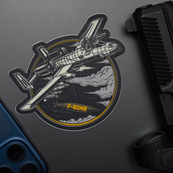 Savage Tacticians sticker with A-10 aircraft and F-BOMB design on laptop