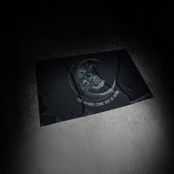 Savage Tacticians flag with skull, night vision, moon, and 'The Goons Come Out At Night' text