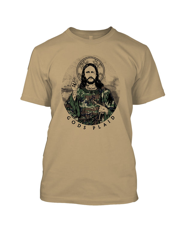 Savage Tacticians Tan tee featuring an illustrated Christ figure in camouflage robes with a halo, "We The People" and "1776" neck tattoos, holding a firearm, arched text "God's Plaid."