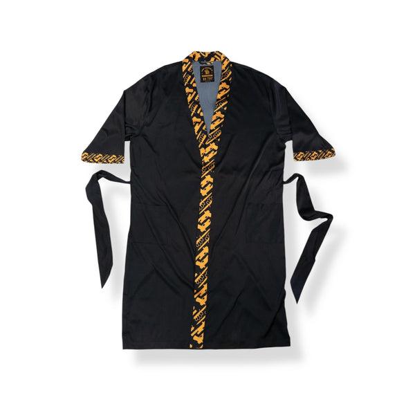 Savage Tacticians black robe with yellow patterned trim and tie belt, laid flat