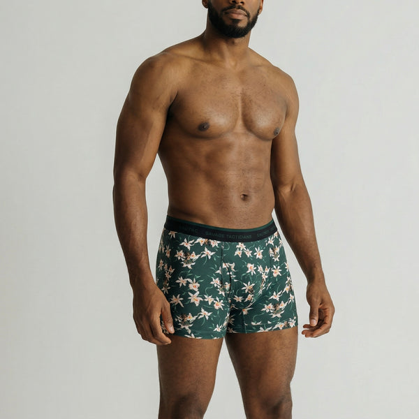 Male model wearing Savage Tacticians floral print green boxer briefs