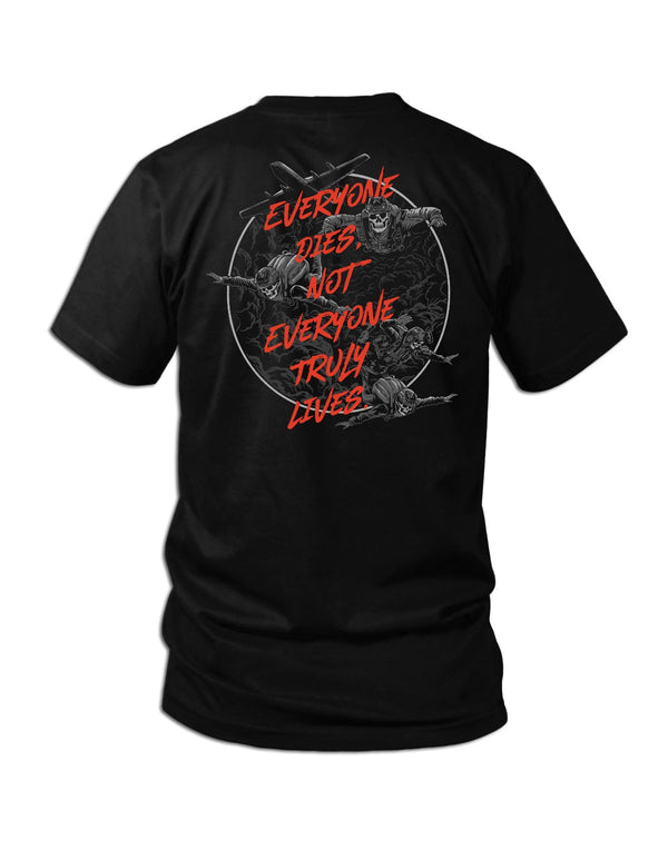 Savage Tacticians Black tee featuring a circular badge of skeletal paratroopers in freefall beneath a cargo plane, bold red text "Everyone Dies, Not Everyone Truly Lives."