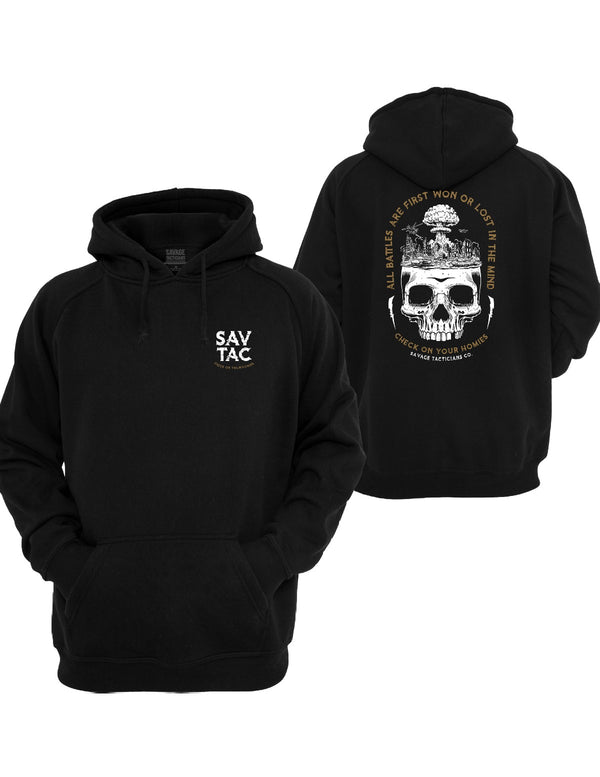 Black Silent Battles Graphic Hoodie by Savage Tacticians. Back print: a skull with a mushroom cloud and ruined city rising from its head, circled by All Battles Are First Won Or Lost In The Mind and Check On Your Homies in gold; small matching Savage Tacticians logo on the left chest