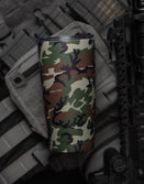 Savage Tacticians camo tumbler with SAV TAC logo, tactical gear and rifle background