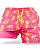 Savage Tacticians pink and yellow pineapple print swim trunks with palm trees
