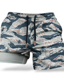 Savage Tacticians men's athletic shorts with blue camouflage and palm tree print