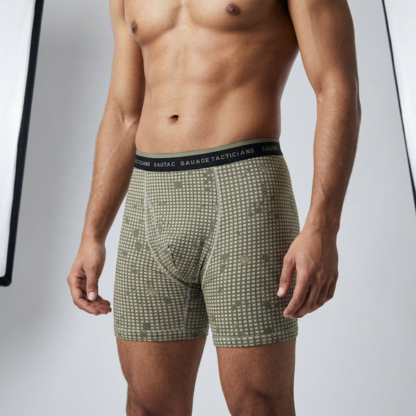 Male model wearing Savage Tacticians camo boxer briefs with logo waistband