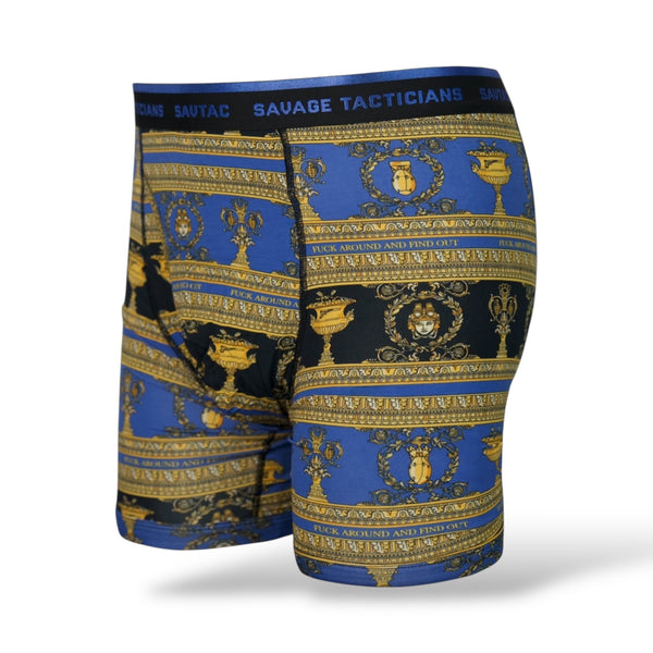 Savage Tacticians men's blue boxer briefs with ornate gold baroque pattern and branded waistband