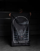 Person holding Savage Tacticians flag with soldier graphic and American flag patch