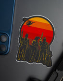 Savage Tacticians sticker with armed soldiers, dog, helicopter, sunset background on laptop