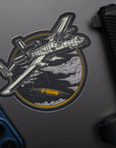 Savage Tacticians sticker with A-10 aircraft and F-BOMB design on laptop