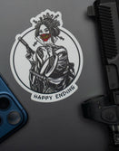 Savage Tacticians Happy Ending sticker with geisha, gun, and fan on gray background near a phone and firearm