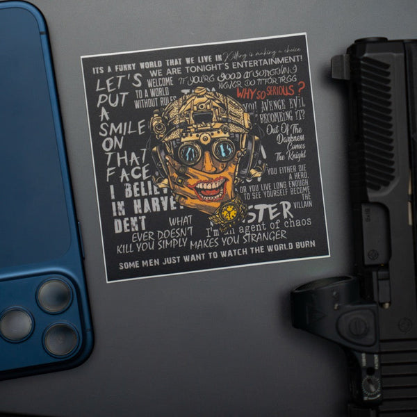 Savage Tacticians sticker featuring a tactical helmet Joker face with quotes, next to a blue phone and firearm.