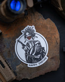 Savage Tacticians Happy Ending sticker with illustrated woman holding handgun, tactical gear background