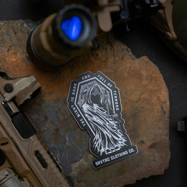 Savage Tacticians sticker with grim reaper and rifle on rock, tactical gear background