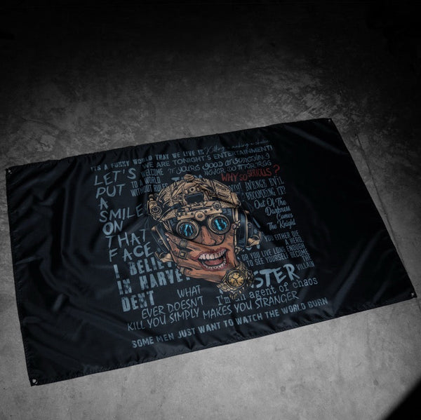 Savage Tacticians flag featuring a grinning tactical helmeted face and bold motivational text