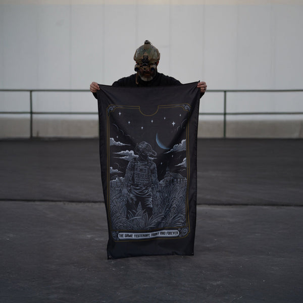 Person in tactical helmet holding Savage Tacticians flag with night sky soldier art