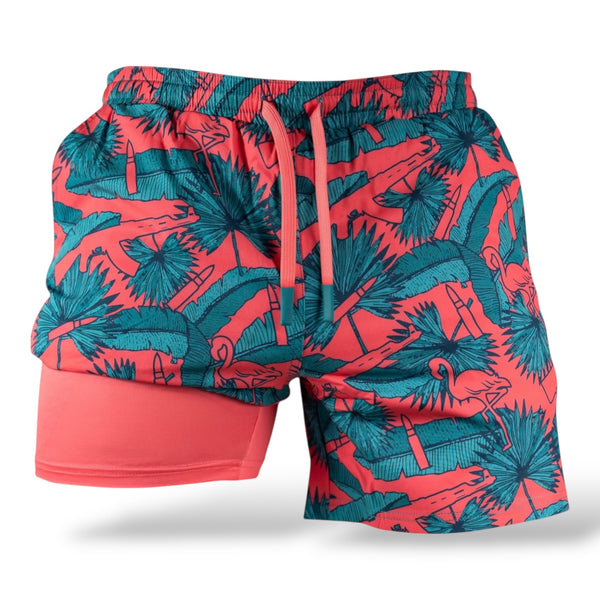 Savage Tacticians coral athletic shorts with teal palm and flamingo pattern