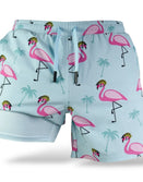 Savage Tacticians light blue shorts with pink flamingo and palm tree print