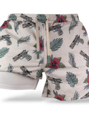 Savage Tacticians men's shorts with pistols, hibiscus flowers, and leaf print design