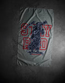 Savage Tacticians flag featuring a grim reaper on skateboard holding a launcher, with 'STAY RAD' text.