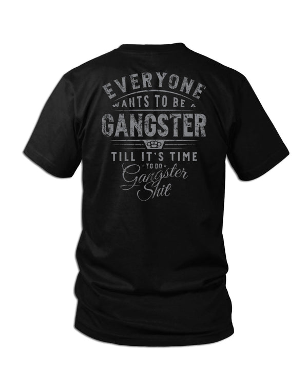 Savage Tacticians Gangster tee; black tactical graphic shirt with large rugged typography and brass knuckles.