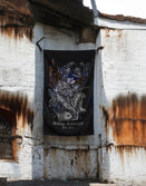 Savage Tacticians black flag with tattooed soldier graphic on a weathered, rusted wall