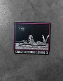 Savage Tacticians sticker with illustrated sniper, night sky, helicopter, and bold branding