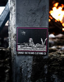 Savage Tacticians sticker with sniper graphic on concrete post, fire in background