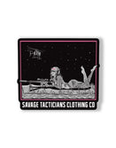 Savage Tacticians patch featuring a tattooed woman sniper at night with a helicopter overhead.