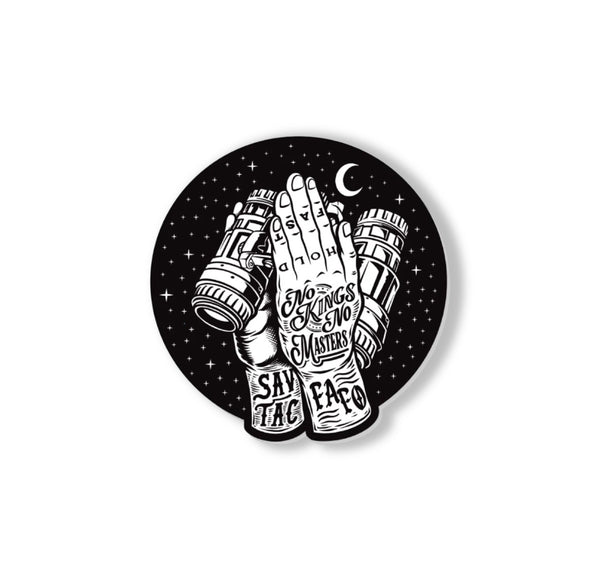 Savage Tacticians praying hands sticker with binoculars, tattoos, and night sky background