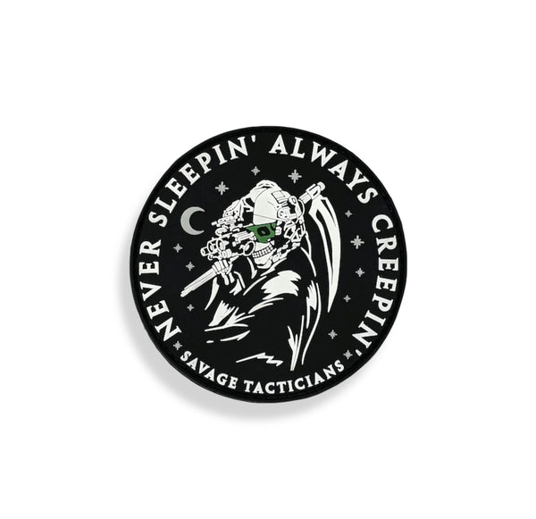 Savage Tacticians PVC patch with reaper in night vision gear, slogan Never Sleepin' Always Creepin'.