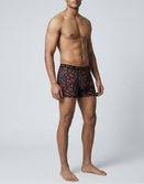 Male model in Savage Tacticians floral print boxer briefs with branded waistband
