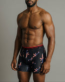 Male model wearing Savage Tacticians boxer briefs with American flag design
