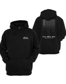 Black Come What May Graphic Hoodie by Savage Tacticians. Back print: a grainy night scene of silhouetted soldiers under a beam of light, with Come What May in blackletter; small matching Savage Tacticians logo on the left chest
