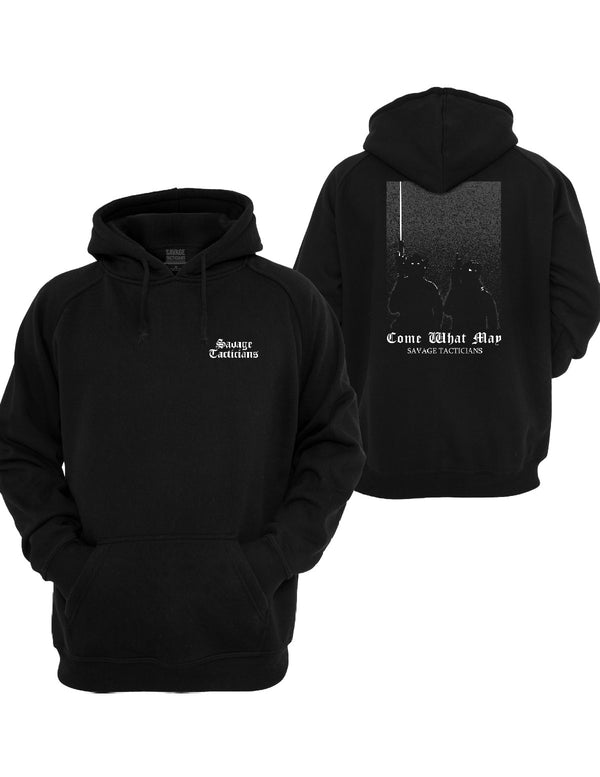 Black Come What May Graphic Hoodie by Savage Tacticians. Back print: a grainy night scene of silhouetted soldiers under a beam of light, with Come What May in blackletter; small matching Savage Tacticians logo on the left chest
